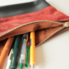Astuccio con zip in tessuto e pelle - immagine 2