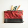 Astuccio con zip in tessuto e pelle